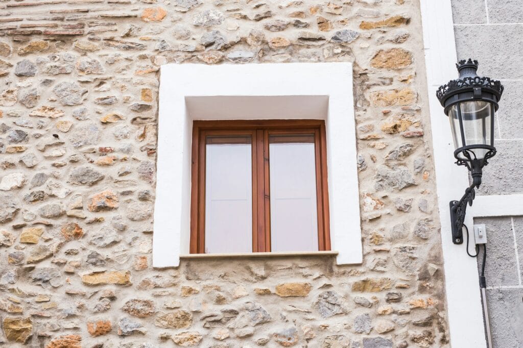 Design, Architecture And Exterior Concept - Modern Wooden Window On The Stone Facade